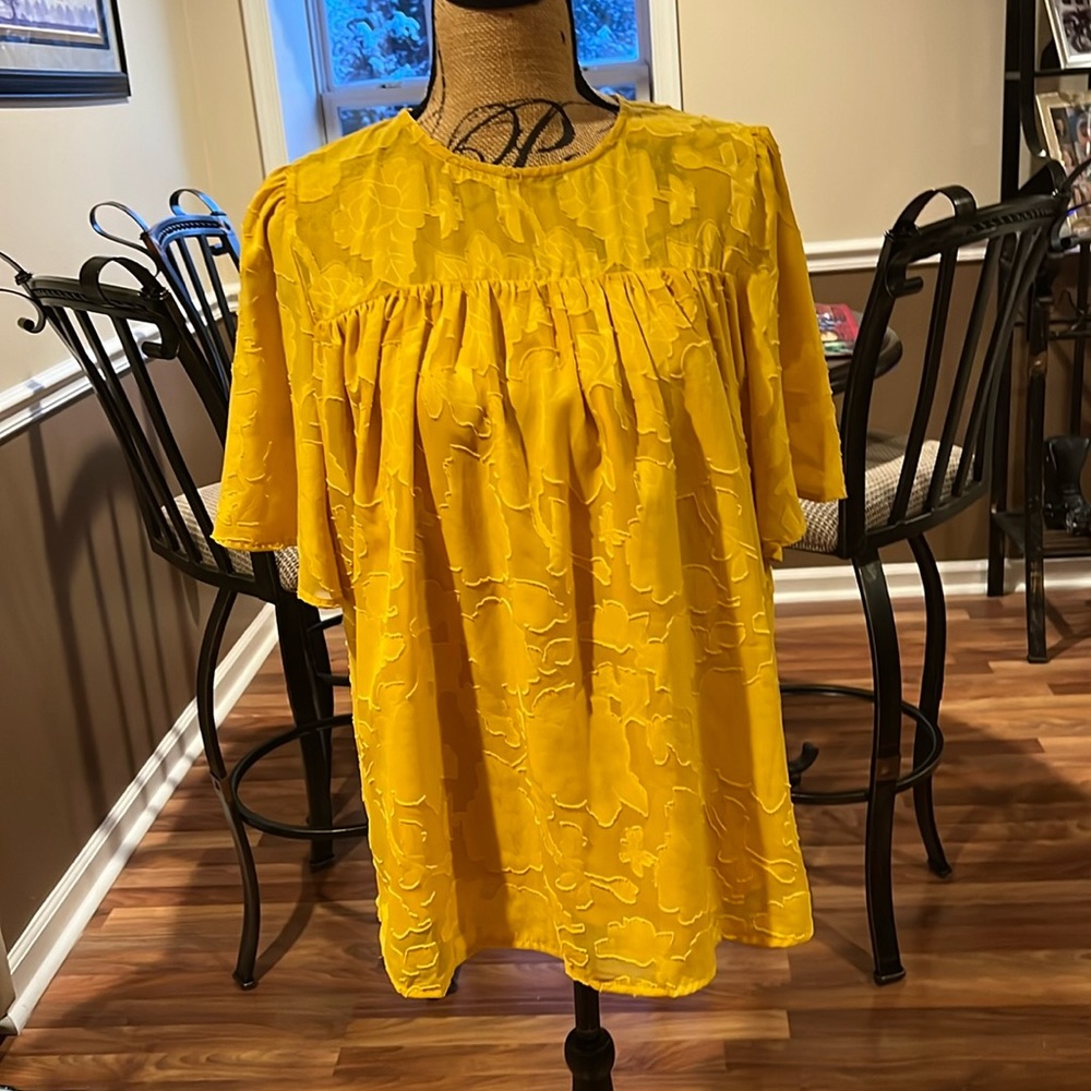 Mustard yellow size large babydoll blouse with a floral lace overlay